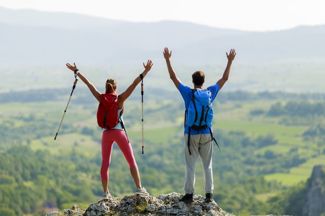 young-couple-hiking-on-the-mountain-2022-05-28-06-17-17-utc (2) (1)